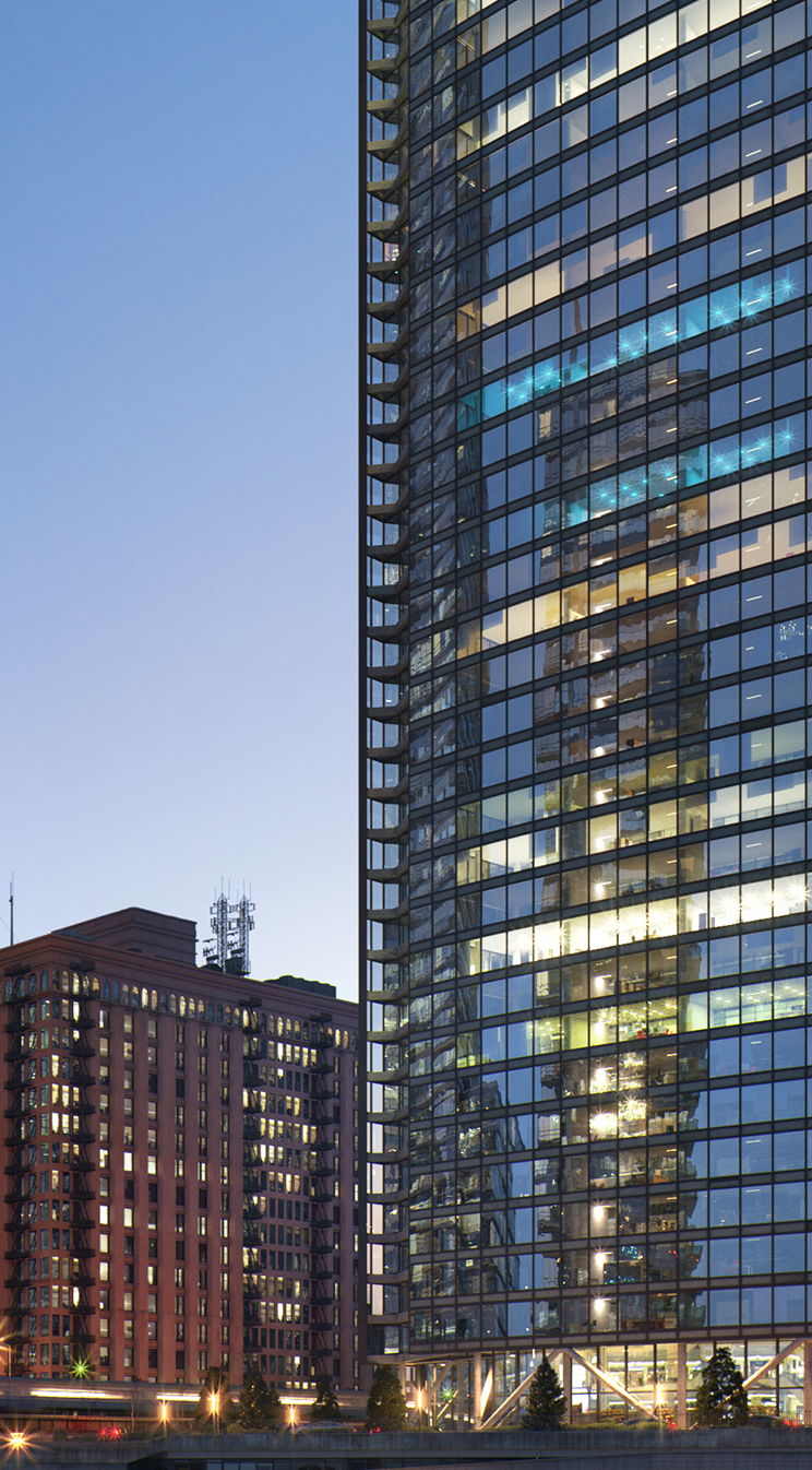 Kết quả của tòa nhà chính, với đồ nội thất và ánh sáng rải rác, vật liệu kính và các tòa nhà để nó phản chiếu