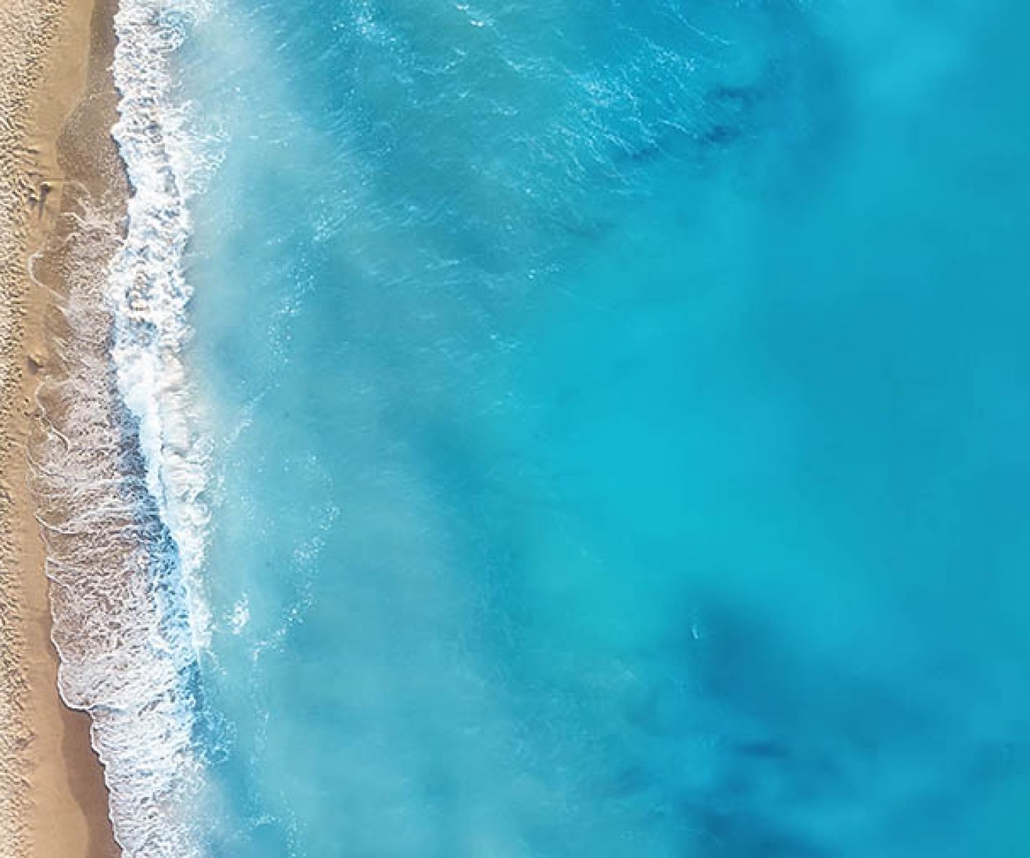 Yacht on the water surface from top view. Turquoise water background from top view. Summer seascape from air. Travel concept and idea